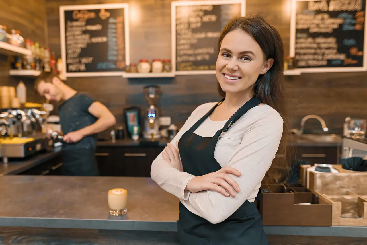 Female barista in front of counter